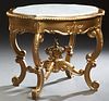 Louis XV Style Gilt Marble Top Center Table, 20th/21st c., the figured white inset tortoise marble on a conforming base with gadrooned edges, over a c