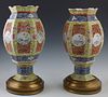 Pair of Chinese Porcelain Candle Lanterns, late 19th c., of hexagonal baluster form, the reticulated sides with floral decorated white oval panels, on