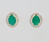 Pair of 14K Yellow Gold Stud Earrings, each with a 1.34 ct. oval emerald atop a border of smll round dimonds, total emerald wt.- 2.68 cts., total diam