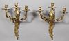 Pair of French Louis XV Style Three Light Sconces, 20th c., the swirling leaf and C-scroll back plates issuing three swirling leaf form arms with pier