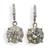 Pair Of 10 Carat Diamond and Gold Stud Earrings
