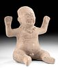 Playful Olmec Terracotta Seated Baby Figure