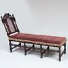 William and Mary Turned and Carved Walnut and Caned Chaise Lounge