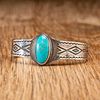 Fred Peshlakai (Dine, 1896-1974) Stamped Silver and Turquoise Cuff Bracelet