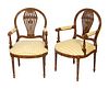 A Pair of Louis XVI Style Balloon Back Open Armchairs
Height 34 inches.