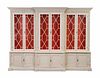 A George III Style White-Painted Breakfront Bookcase
Height 97 1/2 x length 127 1/2 x depth 21 inches.