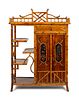 A French Bamboo and Lacquer Cabinet
Height 55 x width 40 x depth 16 1/4 inches.