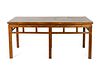 A Chinese Elmwood Table
Height 32 x length 70 x depth 33 1/2 inches.