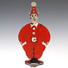 A COLORFUL PIERROT CLOWN SPRING-LOADED GALLERY TARGET