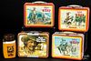 Three Ohio Art Early West tin lunch boxes