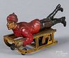 Hess tin lithograph friction boy on sled