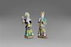Two polychrome porcelain figurines depicting dignitaries, 18th century China
