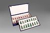 Sixteen chess pieces in jade and sixteen in rose quartz, in box, China, 20th century