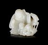 A White Jade Figural Group
Height of jade 2 1/4 in., 5.7 cm.