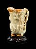 A Russet and Pale Celadon Jade 'Chilong' Rhyton Cup
Height 5 3/4 in., 14.6 cm.