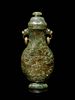 A Carved Spinach Green Jade Ring-Handled Vase and Cover
Height 7 1/4 in., 18.5 cm.
