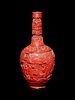 A Cinnabar Lacquer Bottle Vase
Height 10 in., 25.4 cm.