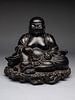 A Black Lacquered 'Jiazhu' Figure of Budai Buddha
Height 10 1/4 in., 26 cm.
