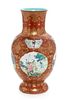 A Gilt Decorated Coral Red Ground Famille Rose Porcelain Vase 
Height 9 3/4 in., 23.7 cm.