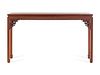 A Huali Wood Side Table, Tiao'an
Height 69 1/2 x width 39 1/2 x depth 16 in., 