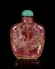 A Tourmaline 'Dragon and Phoenix' Snuff Bottle
Height overall 2 3/4 in., 5.8 cm.