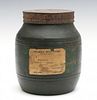 A 19TH CENTURY REDWARE STORAGE JAR IN OLD GREEN PAINT