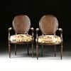 A PAIR OF LOUIS XVI STYLE CANE BACK AND UPHOLSTERED STAINED WOOD FAUTEUILS, 20TH CENTURY,