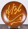 New England slip decorated redware ABC plate