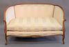 Louis XV style loveseat with custom silk upholstery. ht. 31 1/2", wd. 58".