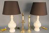 Four table lamps to include pair of white glazed ceramic lamps with Oscar de la Renta shades, total ht. 31" along with two brass Baldwin candlestick l