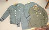 Four US military suits and jackets with buttons.