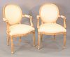 Pair of Hickory Louis XVI style bergeres, white with gold frame, ht. 37", wd. 26".