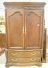 Contemporary armoire having two doors over two drawers, ht. 85", wd. 50"