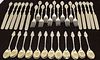 LOT OF 34 PIECES OF MEDALLION PATTERN FLATWARE.