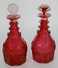 Pair of Cranberry Cut Crystal Glass Decanters