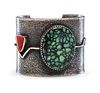 Edison Cummings
(Dine, b. 1962)
Silver Tufa Cast Cuff Bracelet, with Turquoise and Coral Lot is located and will ship from Denver, Colorado