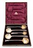 * A Cased English Silver-Plate Serving Set, Mappin & Webb, Sheffield and London, comprising four serving spoons with shell-form