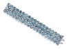 A Platinum, Aquamarine and Diamond Three Row Bracelet, 73.80 dwts.