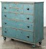 New England or Canadian painted butternut chest of drawers, 19th c., retaining a later blue surface