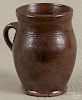 Pennsylvania redware jar, 19th c., 5 1/2'' h.