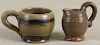 I. S. Stahl redware creamer, 3'' h., and handled cup, 2 1/4'' h.