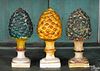 Three Pennsylvania chalkware pineapple garnitures
