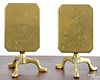Pair of miniature brass tilt top tables