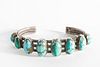 A Navajo Eight Stone Turquoise and Silver Bracelet, ca. 1910