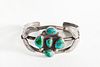 A Navajo Five Stone Turquoise and Silver Cuff Bracelet, ca. 1930