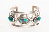 A Navajo Three Stone Bisbee Turquoise and Silver Cuff Bracelet