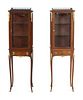 A Near Pair of Louis XV Style Gilt Bronze Mounted Vitrine Cabinets