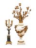 A Neoclassical Gilt Bronze Mounted White Marble Candelabrum and an Empire Style Gilt and Patinated Bronze Figural Candelabrum