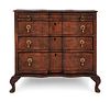 A Continental Walnut Diminutive Chest of Drawers or Salesman's Model