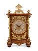 An Ansonia Cabinet B Gilt Metal Mounted Oak Shelf Clock